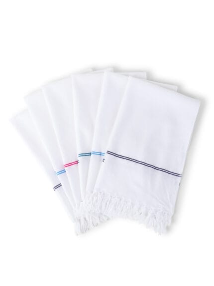 Stack of six pure white cotton napkins with lining