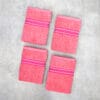 Pack of four 100% pure cotton terry hand towels with soft texture and high absorbency, suitable for bathroom and daily use.