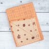 Zahya cotton zero twist bath towel in peach printed checkered pattern, folded, dual layer, highly absorbent and quick-dry, large size