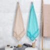 Zahya Bamboo Bath Towels — Bamboo Straw and Aqua Green (Pack of 2) Zahya 100% pure bamboo bath towels in brown and aqua green, pack of 2, hanging, lightweight and quick-dry, large size