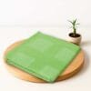 Zahya 100% pure bamboo bath towel in light green color, folded, lightweight and quick-dry, large size