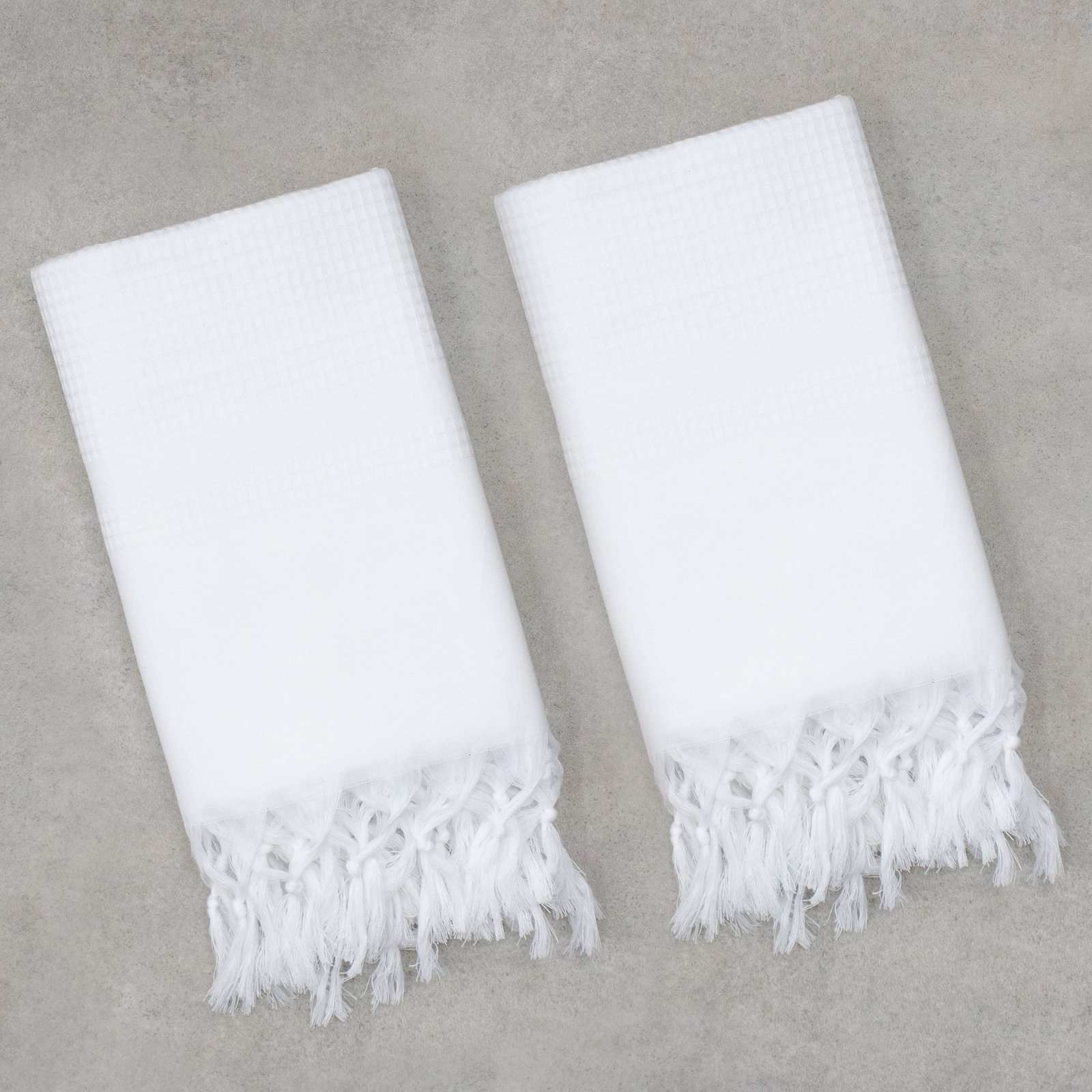 Zahya Turkish Style Towel - White - Pack of 2 Zahya white waffle weave Turkish style towels with fringe, pack of 2, laid flat on stone surface
