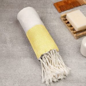 Zahya 100% pure bamboo Turkish towel in yellow color, rolled with fringe, lightweight and quick-dry, large size