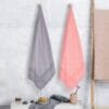 Zahya 100% pure bamboo bath towels in grey and peach, pack of 2, hanging, lightweight and quick-dry, large size