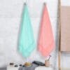 Zahya Bamboo Bath Towels — Coral and Opal Green (Pack of 2) Zahya 100% pure bamboo bath towels in peach and opal green, pack of 2, hanging, lightweight and quick-dry, large size