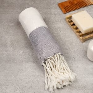 Zahya 100% pure bamboo Turkish towel in grey color, rolled with fringe, lightweight and quick-dry, large size