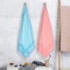 Zahya Bamboo Bath Towels — Coral and Pure Sky (Pack of 2) Zahya 100% pure bamboo bath towels in blue and peach, pack of 2, hanging, lightweight and quick-dry, large size