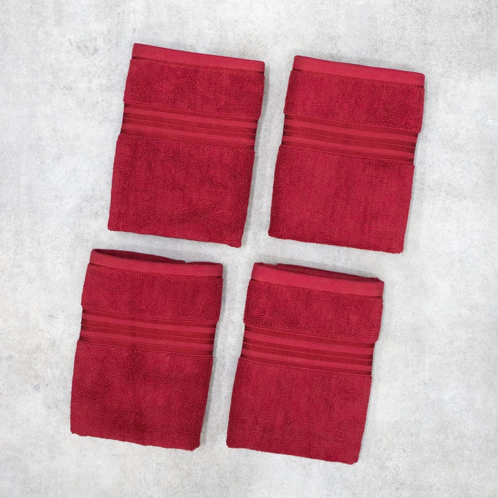 Zahya Terry Hand Towel - Crimson Red - Pack of 4 Zahya 100% pure cotton terry hand towels in red color, pack of 4, folded, soft and highly absorbent, 500 GSM